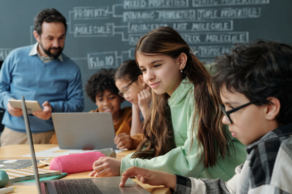 Students on computers doing homework